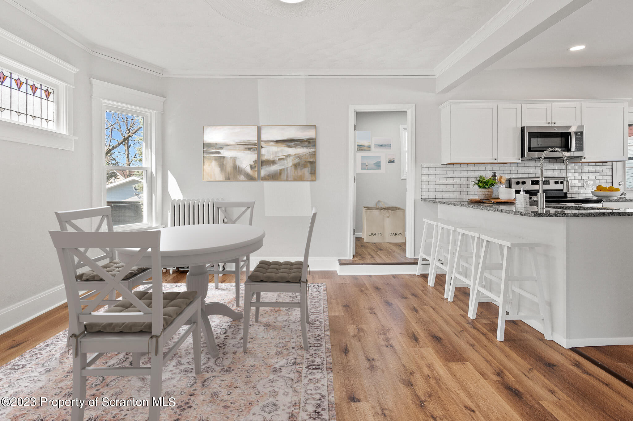 1605 Roosevelt Street Dunmore, PA 18512 - Photo 20 of 70 a dining room with furniture and wooden floor