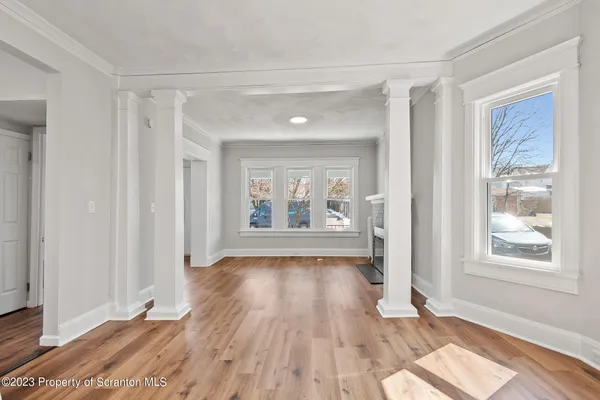 a kitchen with granite countertop a sink stainless steel appliances and cabinets