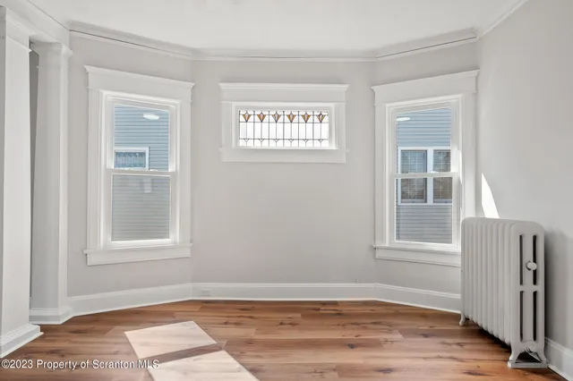 a kitchen with stainless steel appliances granite countertop a sink and a stove