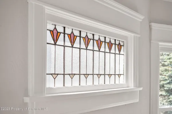 a kitchen with stainless steel appliances a stove a microwave a sink and cabinets