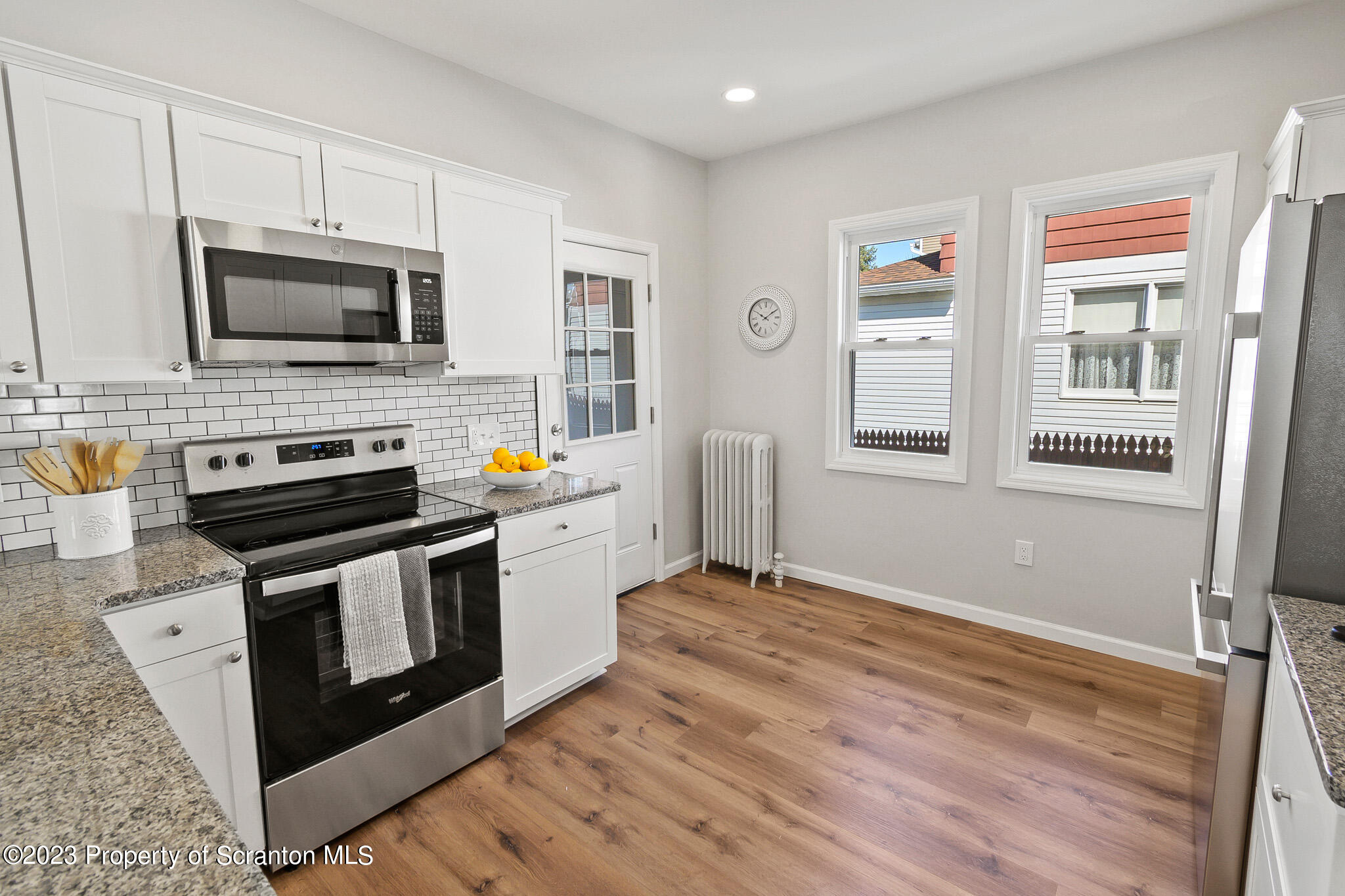 1605 Roosevelt Street Dunmore, PA 18512 - Photo 34 of 70 a kitchen with stainless steel appliances a stove microwave and refrigerator