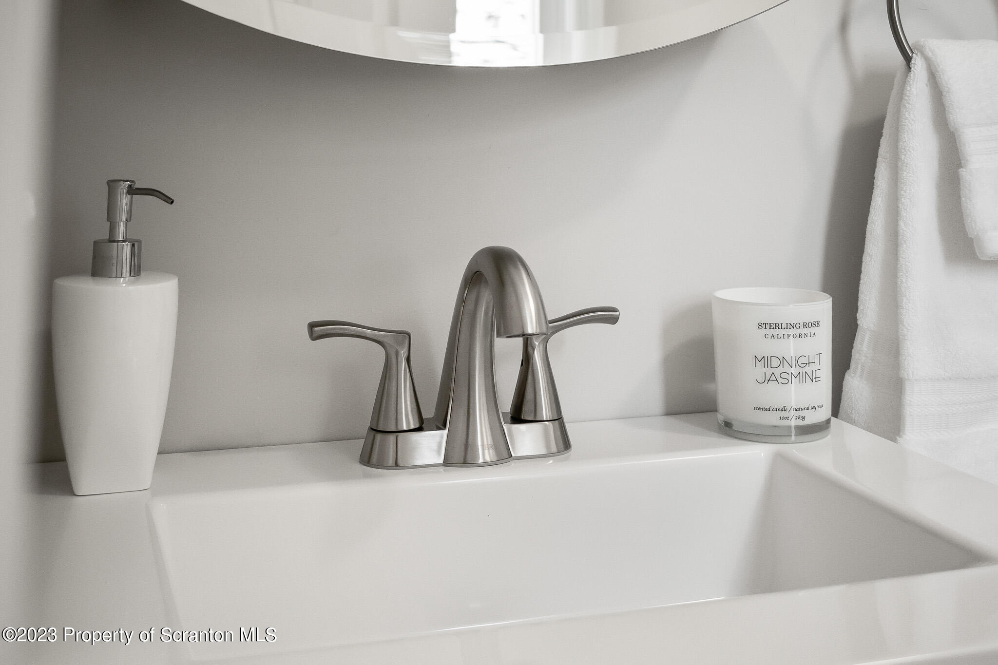 1605 Roosevelt Street Dunmore, PA 18512 - Photo 38 of 70 a close view of a faucet a sink and a window