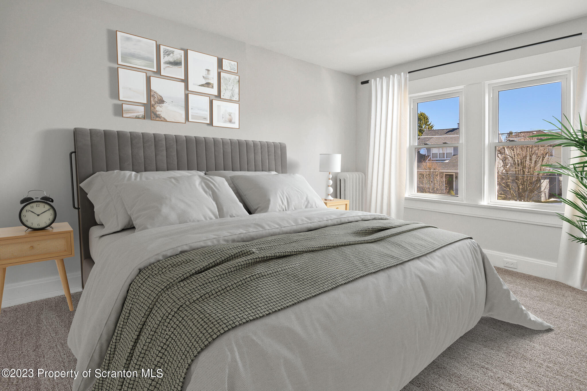 1605 Roosevelt Street Dunmore, PA 18512 - Photo 43 of 70 a bedroom with a large bed and a window