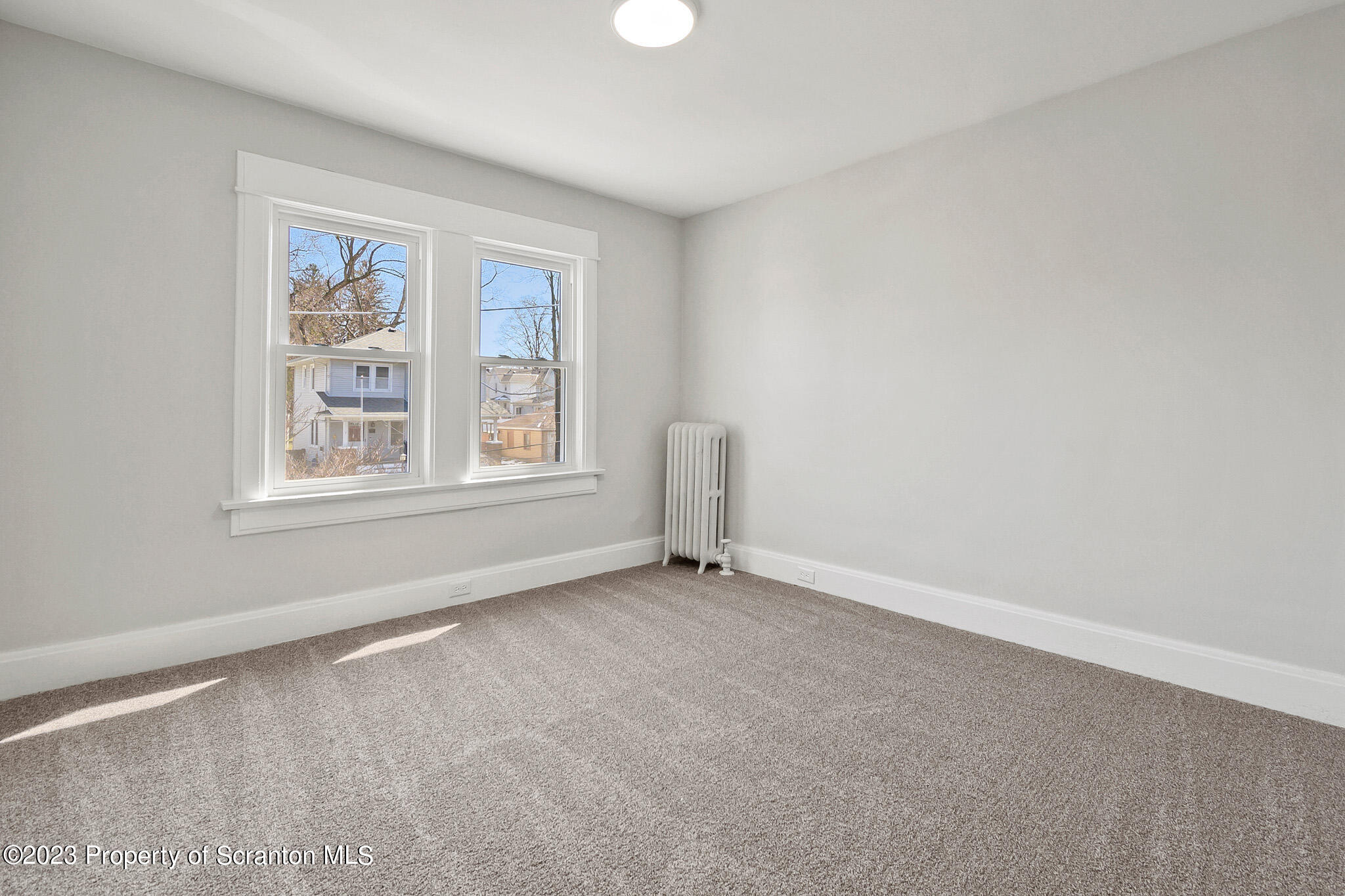 1605 Roosevelt Street Dunmore, PA 18512 - Photo 54 of 70 an empty room with windows