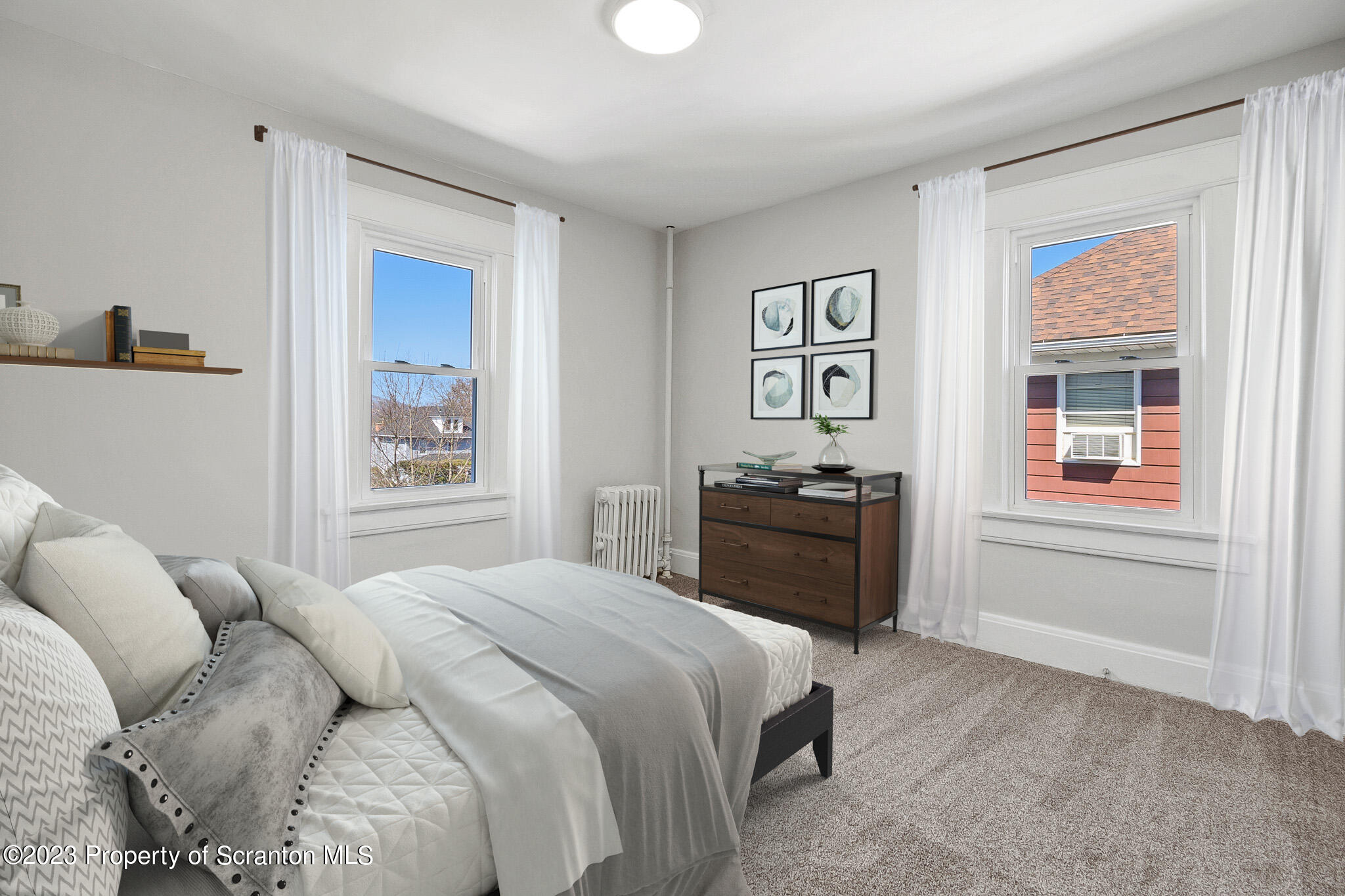 1605 Roosevelt Street Dunmore, PA 18512 - Photo 59 of 70 a bedroom with a bed and a window