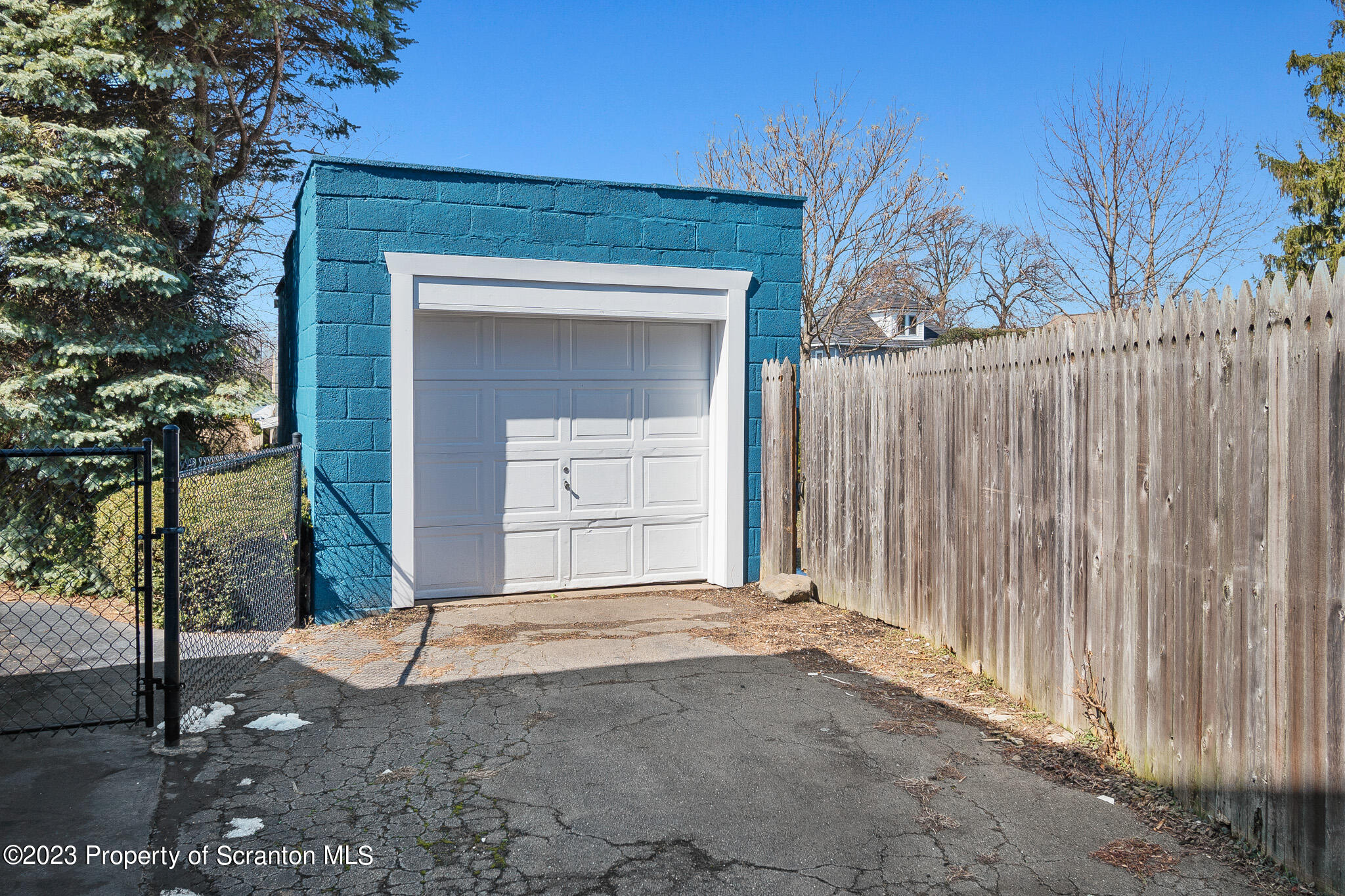 1605 Roosevelt Street Dunmore, PA 18512 - Photo 70 of 70 a view of a house with a wooden fence