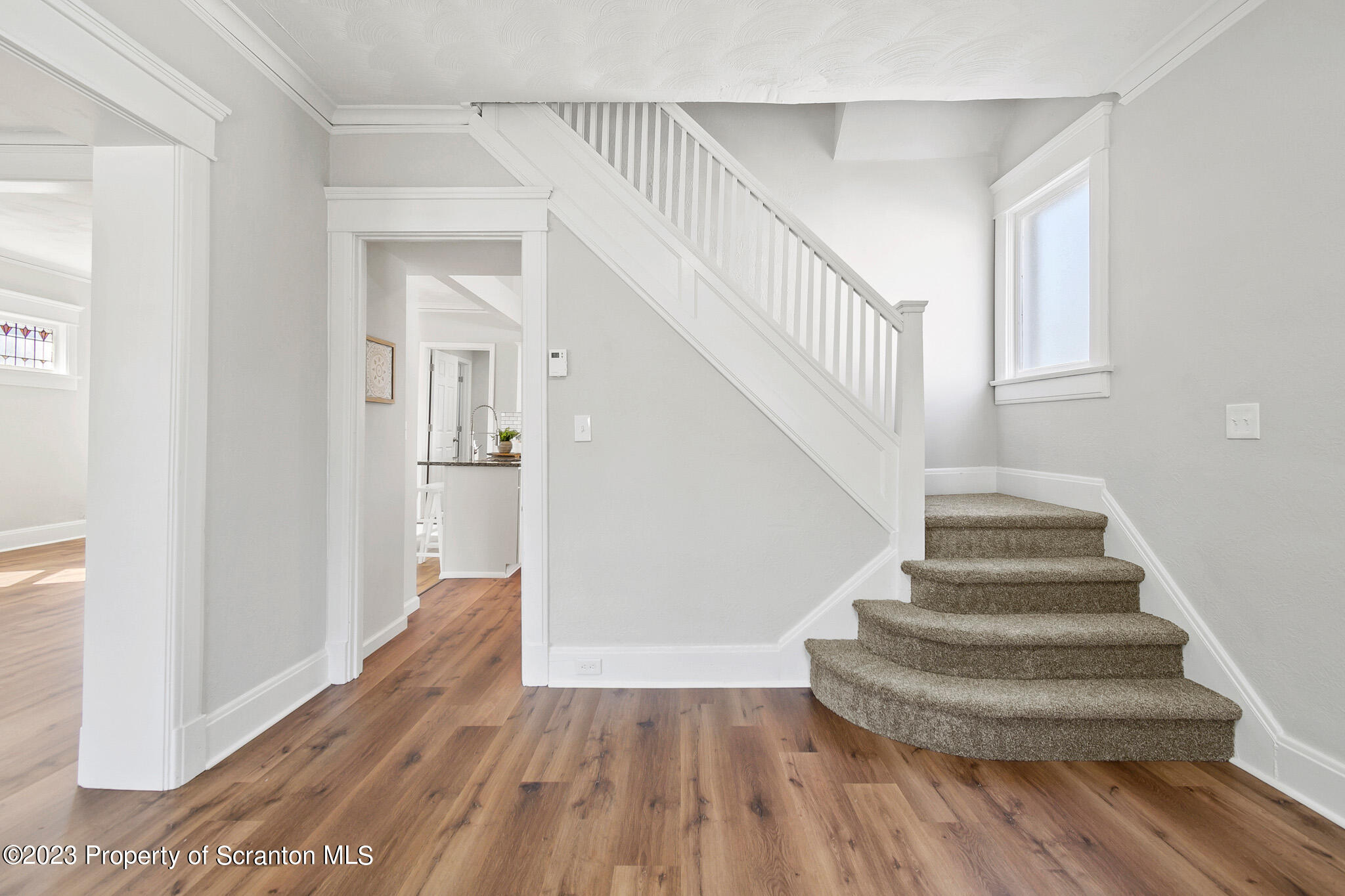 1605 Roosevelt Street Dunmore, PA 18512 - Photo 8 of 70 a view of entryway and hall with wooden floor