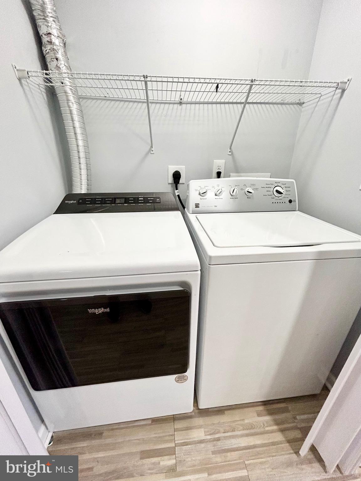 6116 Edlynne Road Baltimore, MD 21239 - Photo 18 of 18 a utility room with a washer and dryer