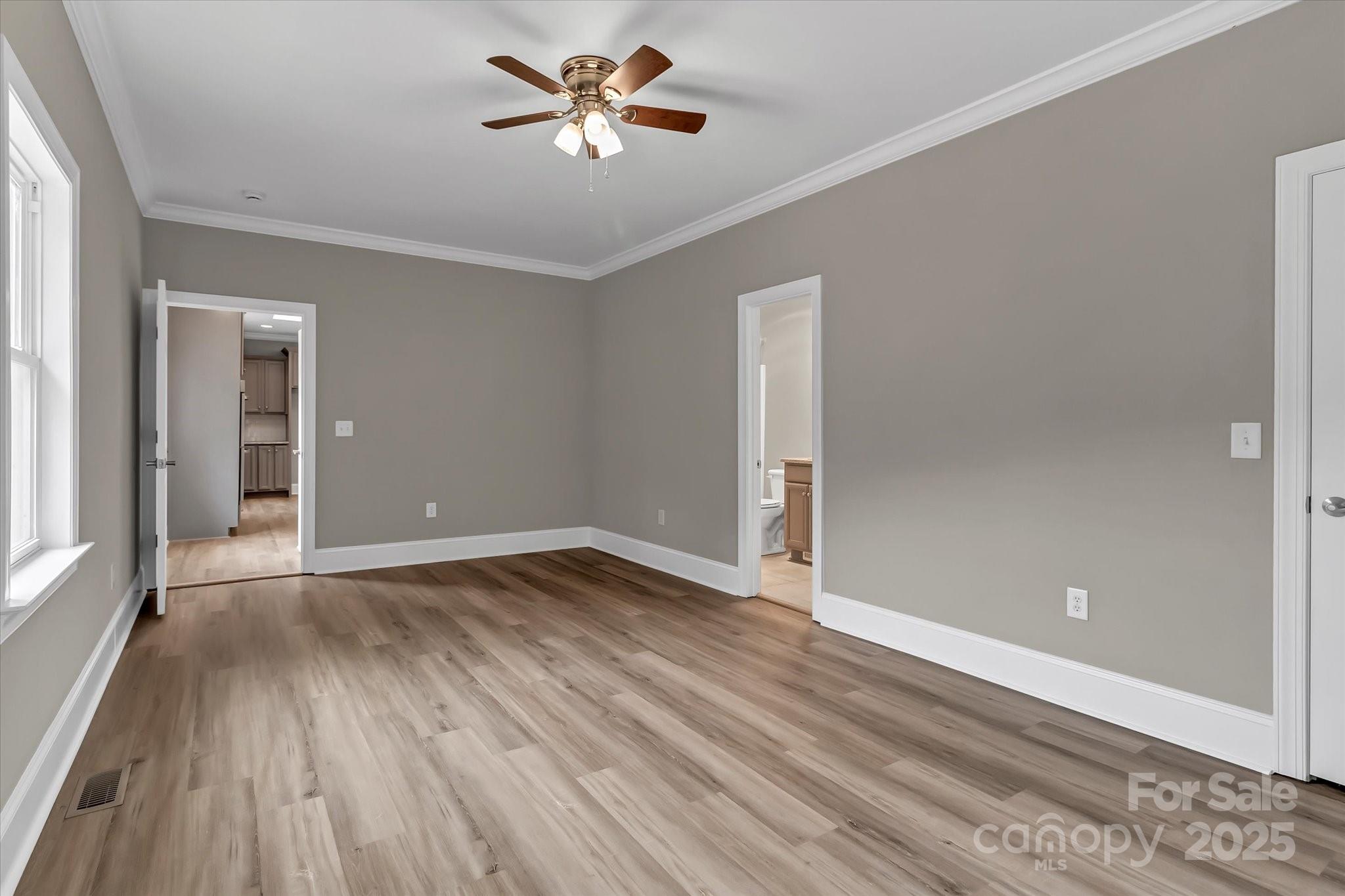 332 East Rebound Road Lancaster, SC 29720 - Photo 15 of 29 wooden floor in an empty room with a window
