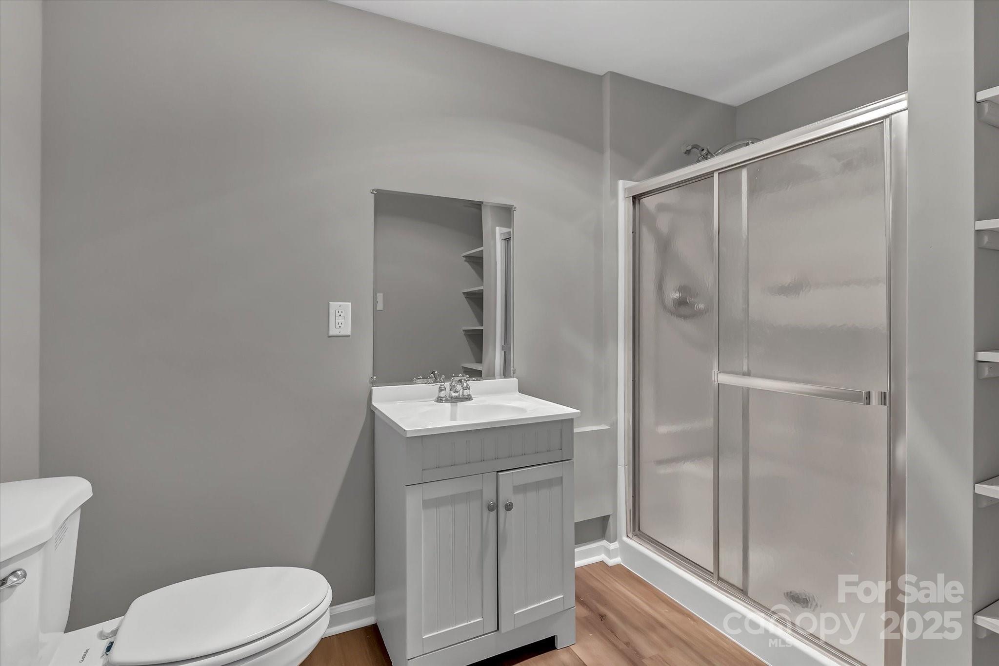 332 East Rebound Road Lancaster, SC 29720 - Photo 18 of 29 a bathroom with a toilet a sink and shower