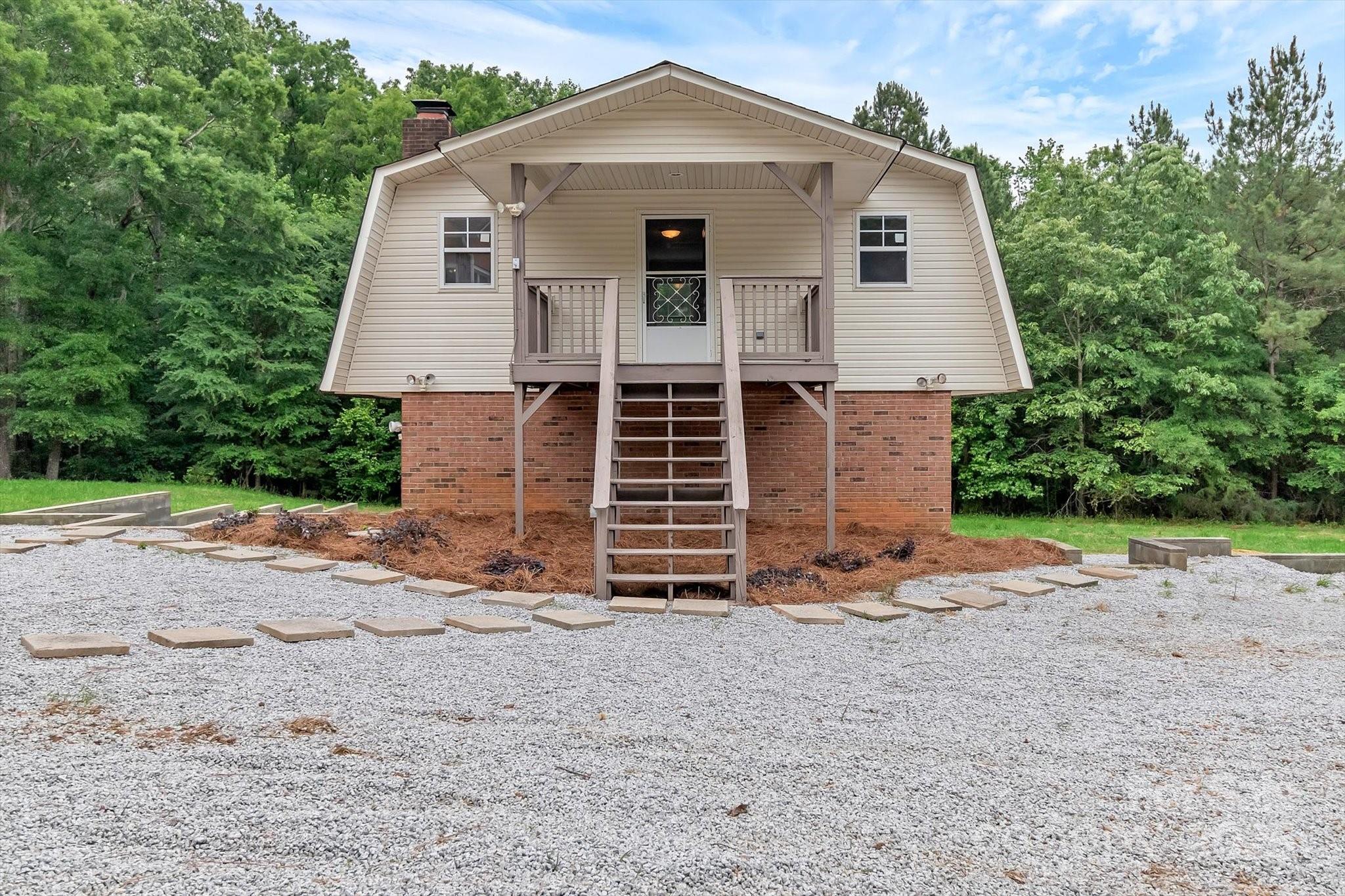 332 East Rebound Road Lancaster, SC 29720 - Photo 19 of 29 a front view of a house with a yard