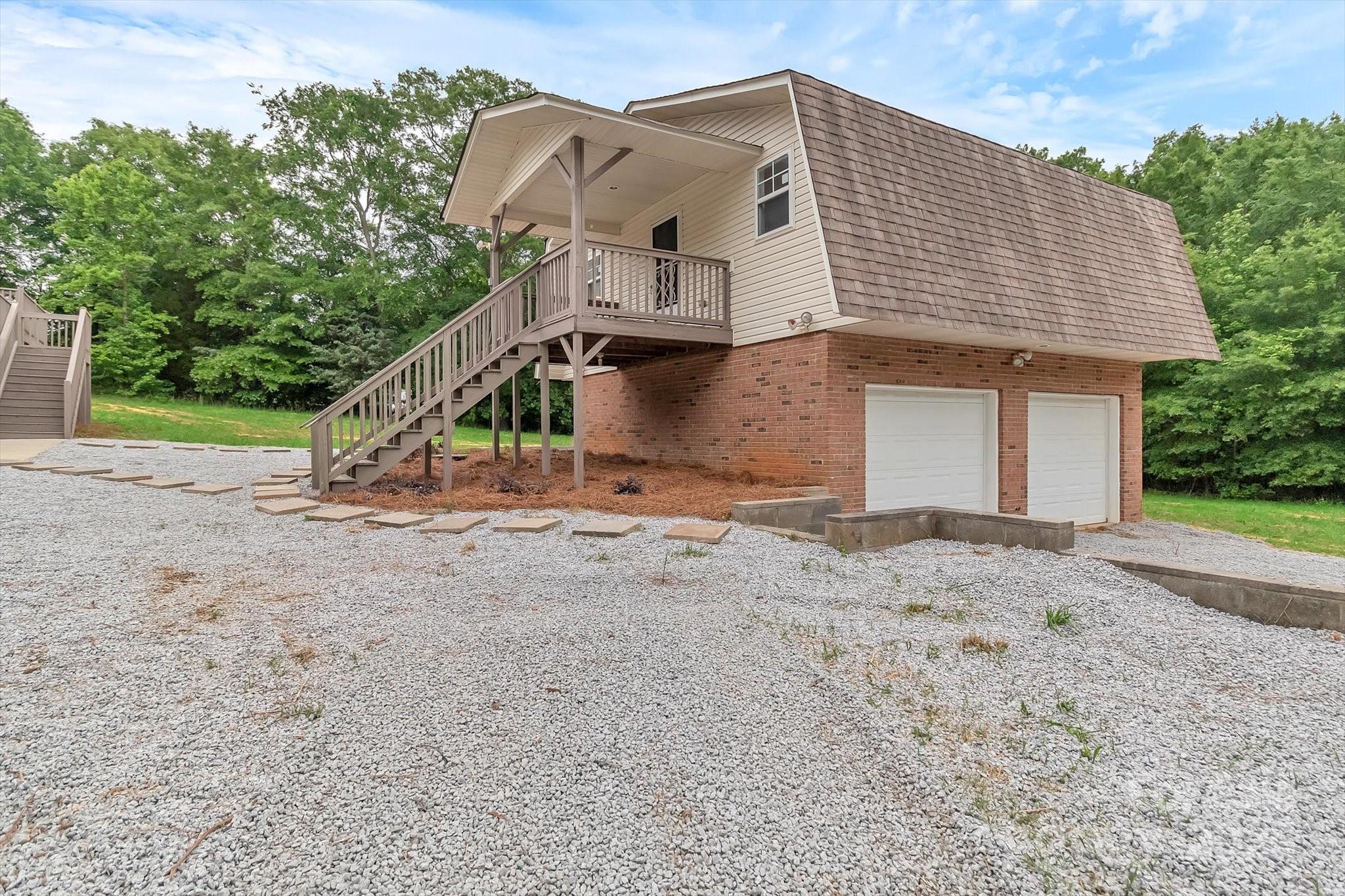 332 East Rebound Road Lancaster, SC 29720 - Photo 20 of 29 a front view of a house with a yard