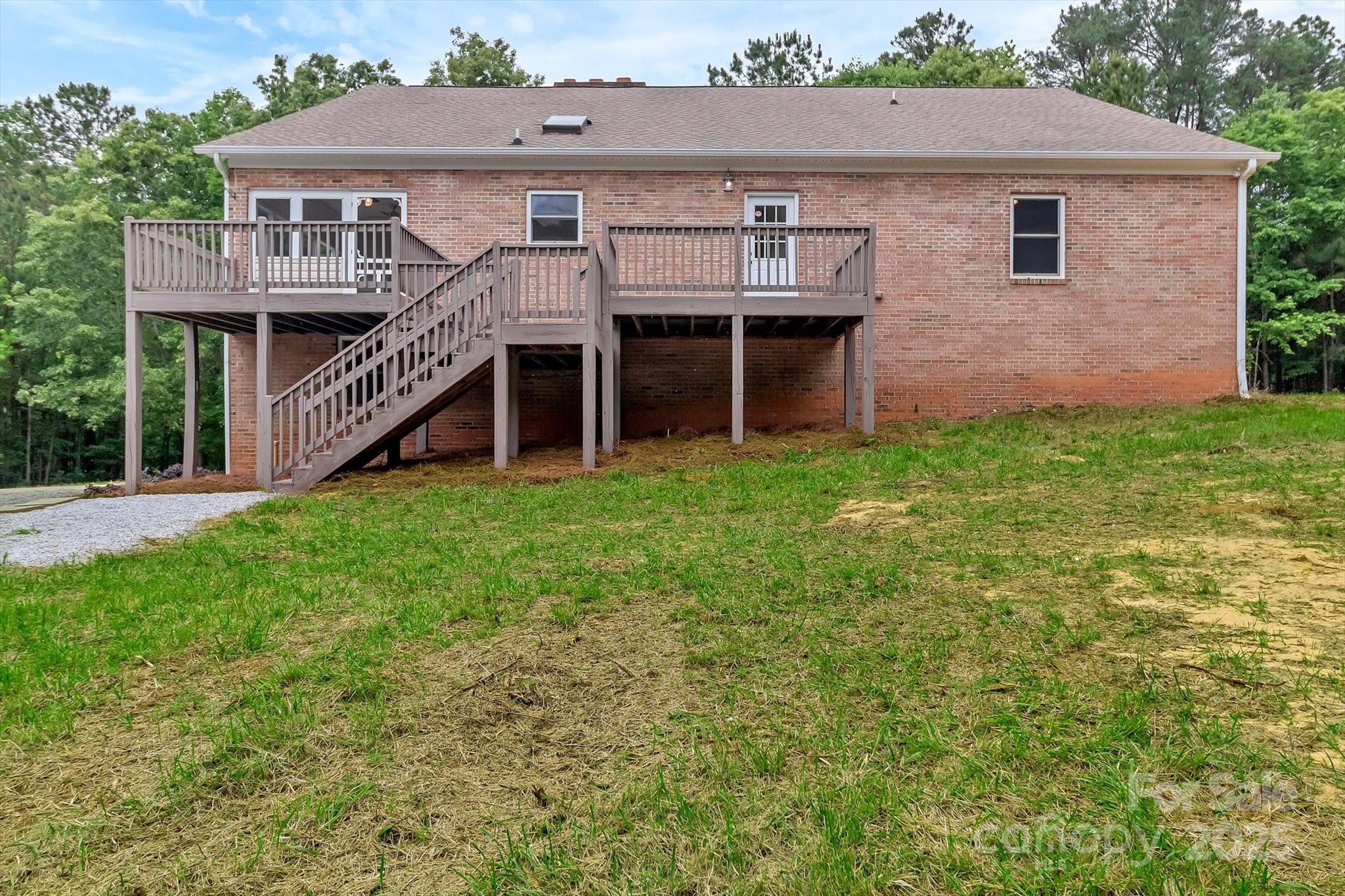332 East Rebound Road Lancaster, SC 29720 - Photo 2 of 29 a aerial view of a house with a yard and deck