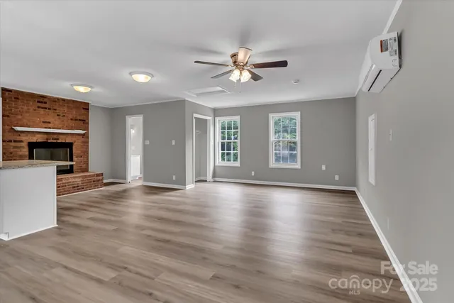 a kitchen with stainless steel appliances granite countertop a stove and a sink