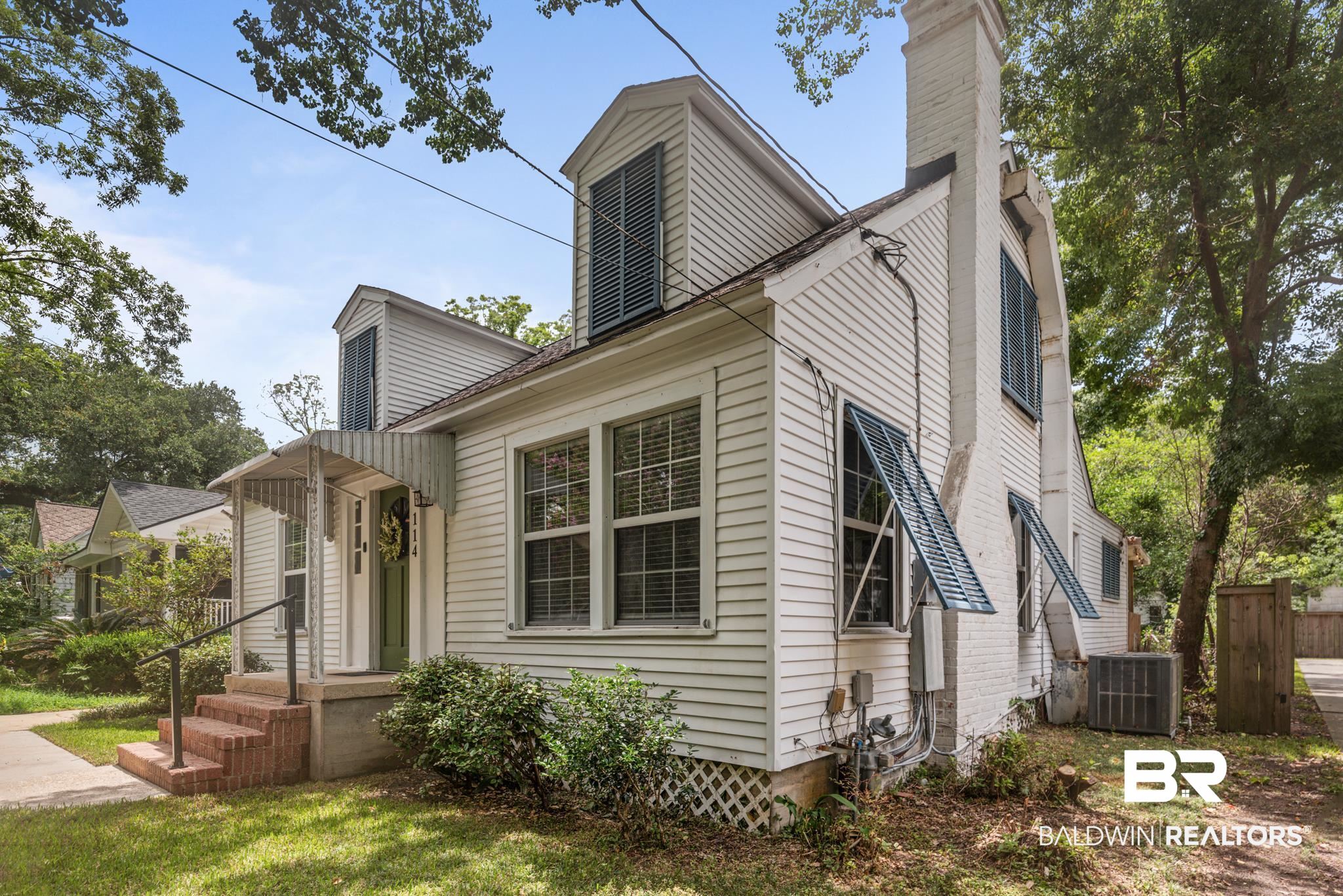 114 Crenshaw Street Mobile, AL 36606 - Photo 6 of 49 View of front facade with central air condition unit