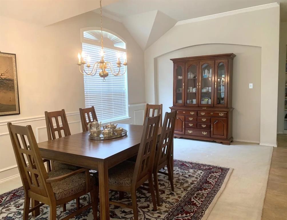 7908 Thorneywood Road Plano, TX 75024 - Photo 4 of 5 a view of a dining room with furniture