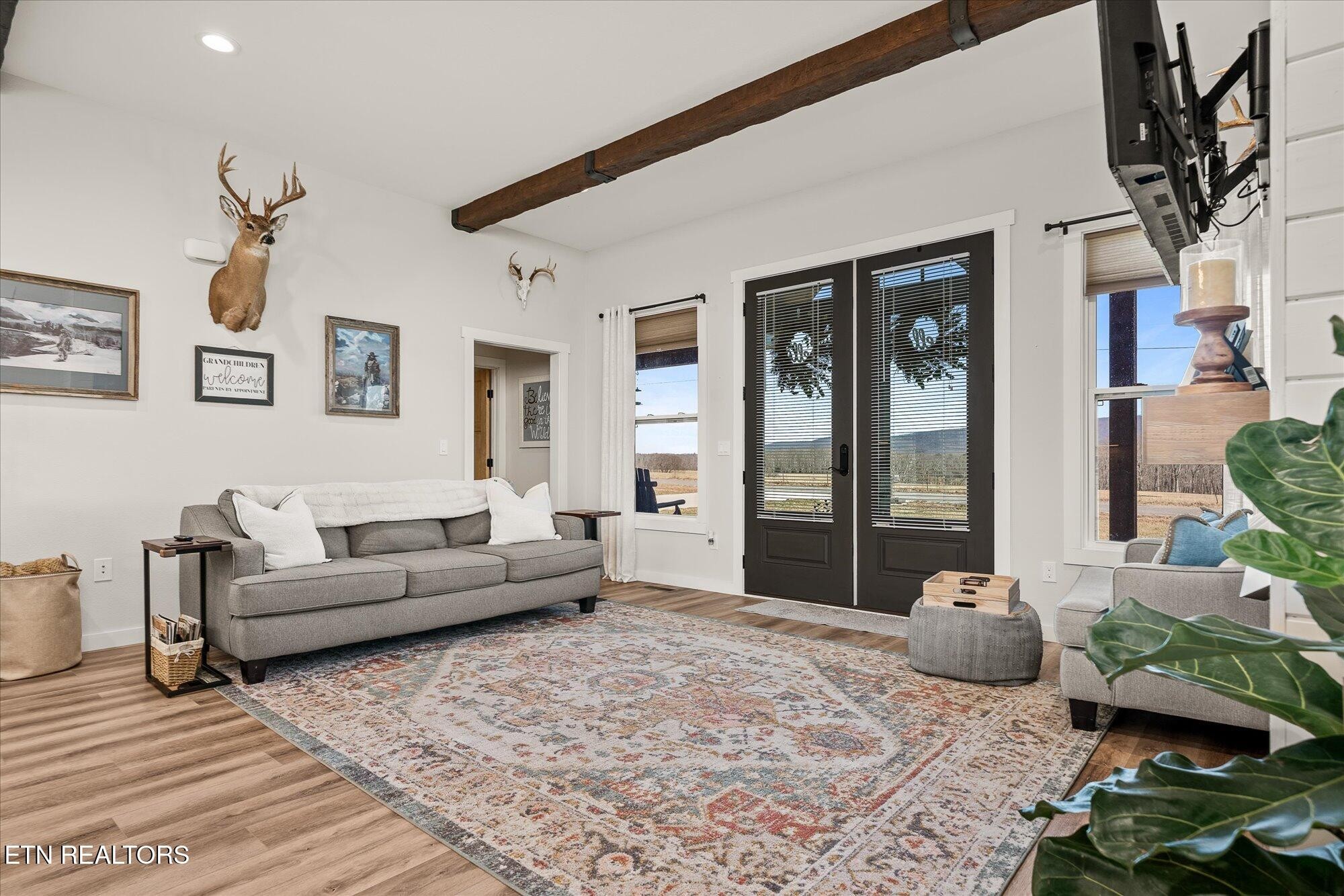 768 Winningham Road Crossville, TN 38572 - Photo 8 of 54 a living room with furniture and a large window
