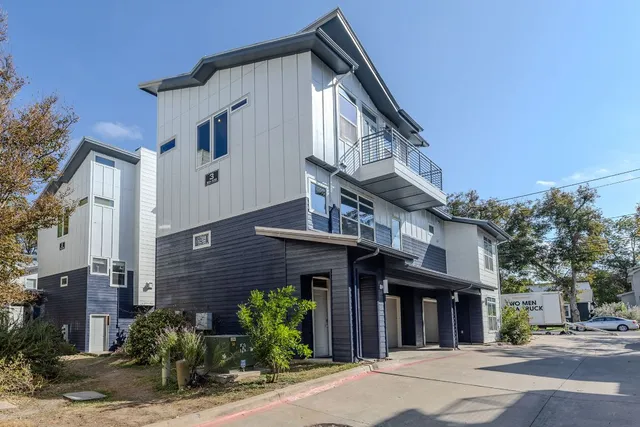 a view of a building with a street