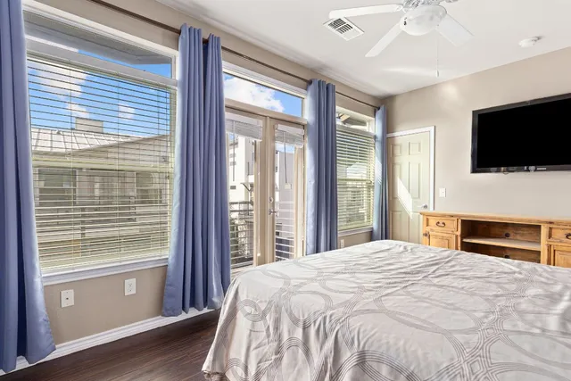 a bedroom with bed and window