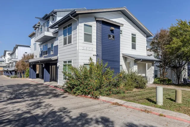 a backyard of a house with seating space