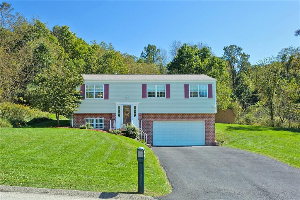 7326 Ringertown Road Export, PA 15632 - Photo 1 of 25 a front view of a house with a yard