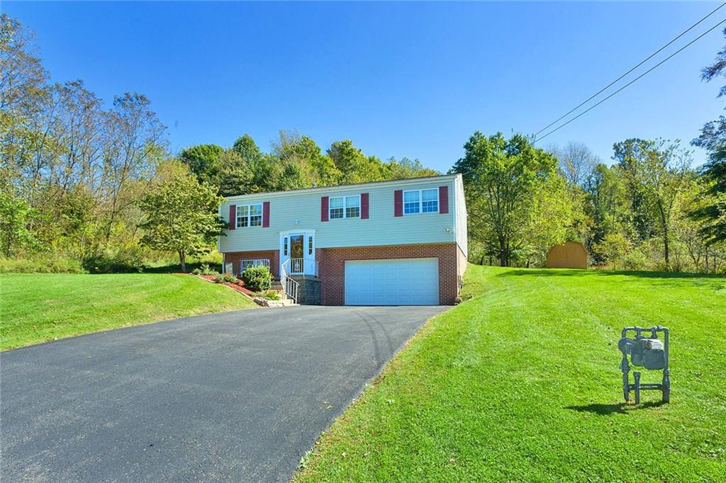 7326 Ringertown Road Export, PA 15632 - Photo 2 of 25 a view of a house with a yard and tree s