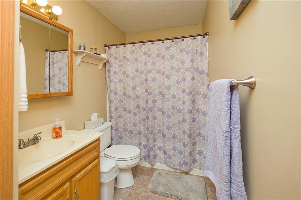7326 Ringertown Road Export, PA 15632 - Photo 18 of 25 a bathroom with a sink and a toilet