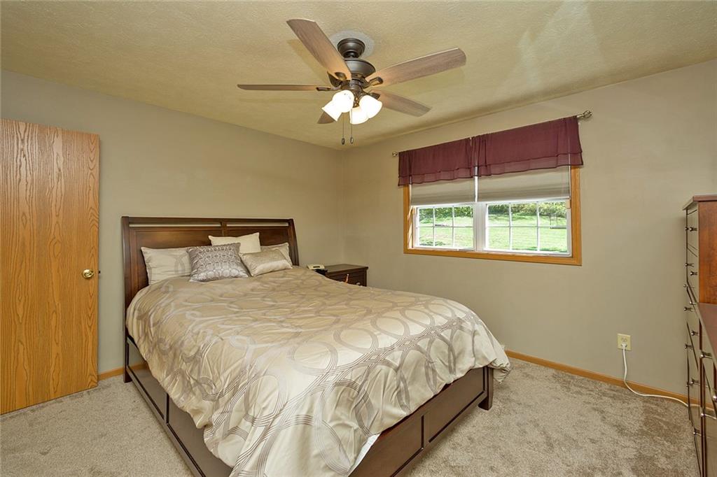 7326 Ringertown Road Export, PA 15632 - Photo 19 of 25 a bedroom with a bed and window