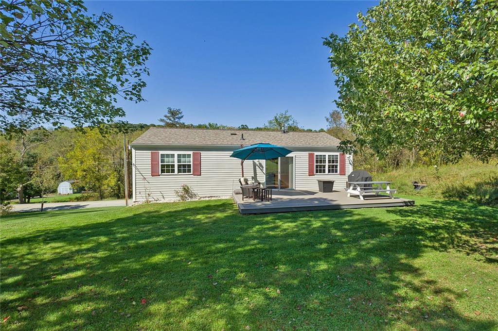 7326 Ringertown Road Export, PA 15632 - Photo 3 of 25 a front view of a house with yard patio and green space