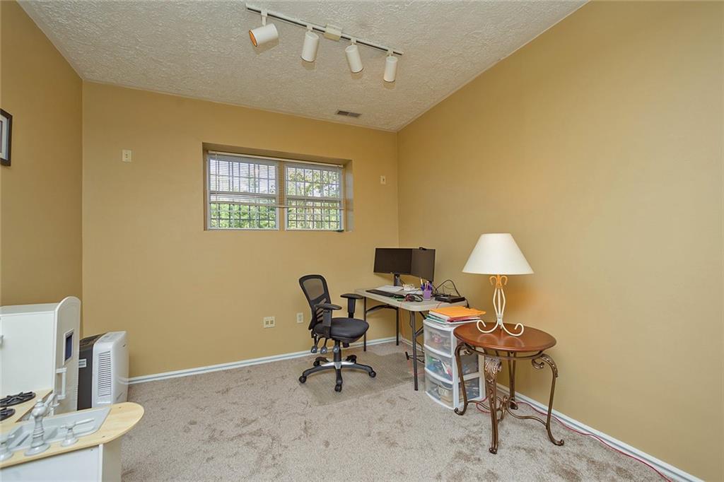 7326 Ringertown Road Export, PA 15632 - Photo 23 of 25 a living room with furniture and a lamp