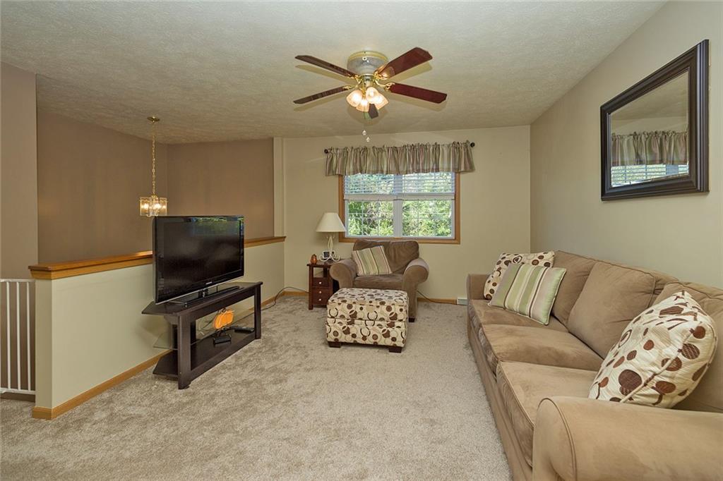 7326 Ringertown Road Export, PA 15632 - Photo 9 of 25 a living room with furniture and a large window