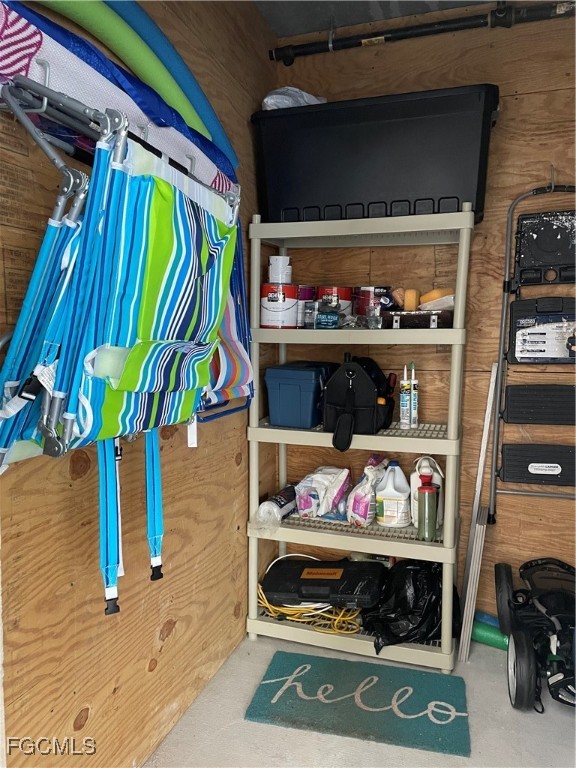 10371 Butterfly Palm Drive, Unit 834 Fort Myers, FL 33966 - Photo 19 of 22 a living room filled with furniture and a potted plant