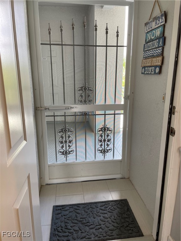 10371 Butterfly Palm Drive, Unit 834 Fort Myers, FL 33966 - Photo 20 of 22 a view of entryway
