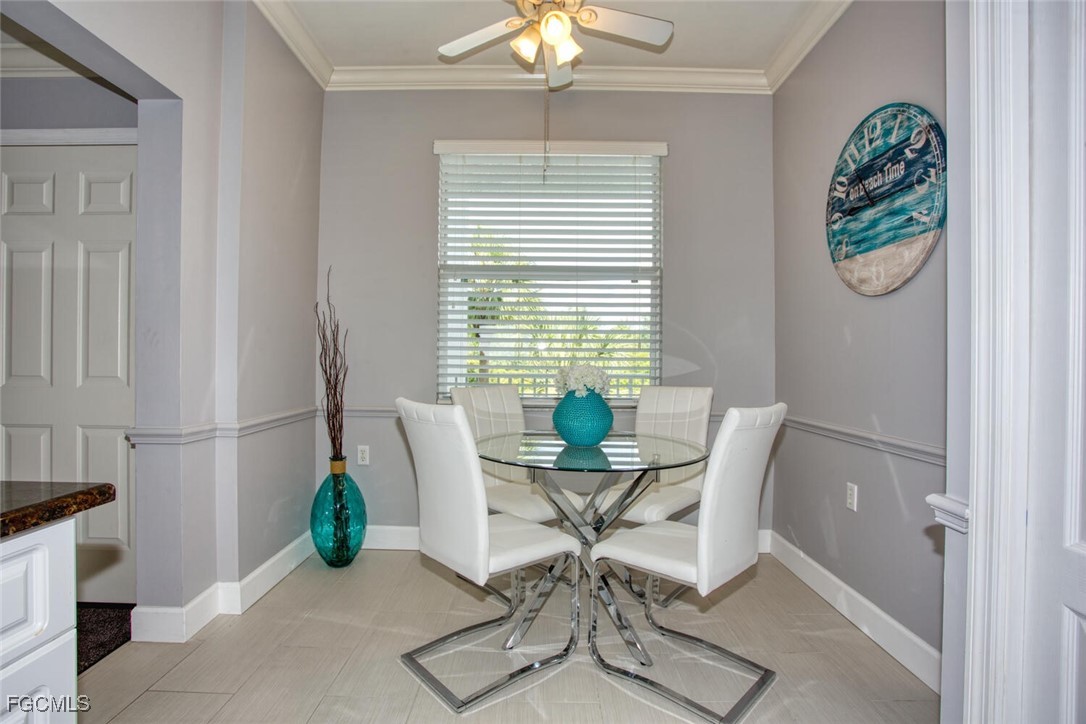 10371 Butterfly Palm Drive, Unit 834 Fort Myers, FL 33966 - Photo 5 of 22 a workspace with furniture and a window