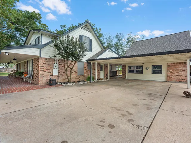 front view of a house with a patio