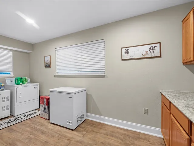 a utility room with a window dryer and washer