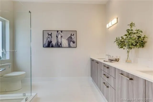 a bathroom with a bathtub sink and toilet