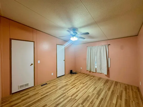 a view of a livingroom with a ceiling fan