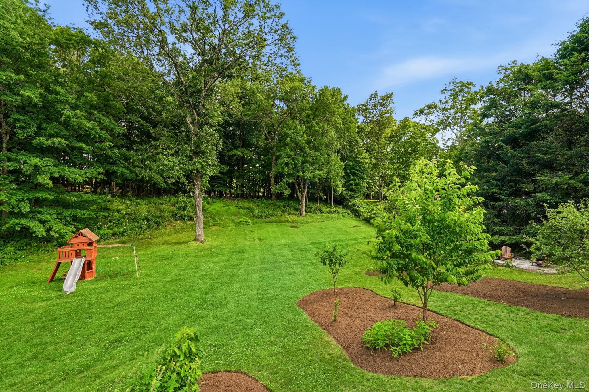 119 Mustato Road Katonah, NY 10536 - Photo 22 of 31 Back yard view with specimen plantings