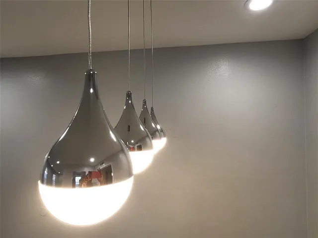 a room with window and white walls