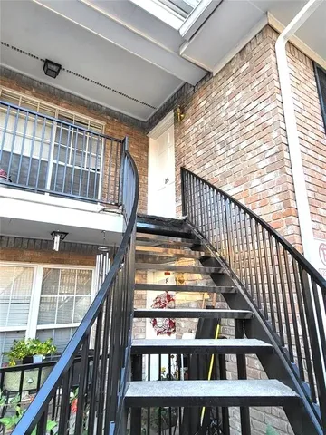 a view of a kitchen with a sink and dishwasher
