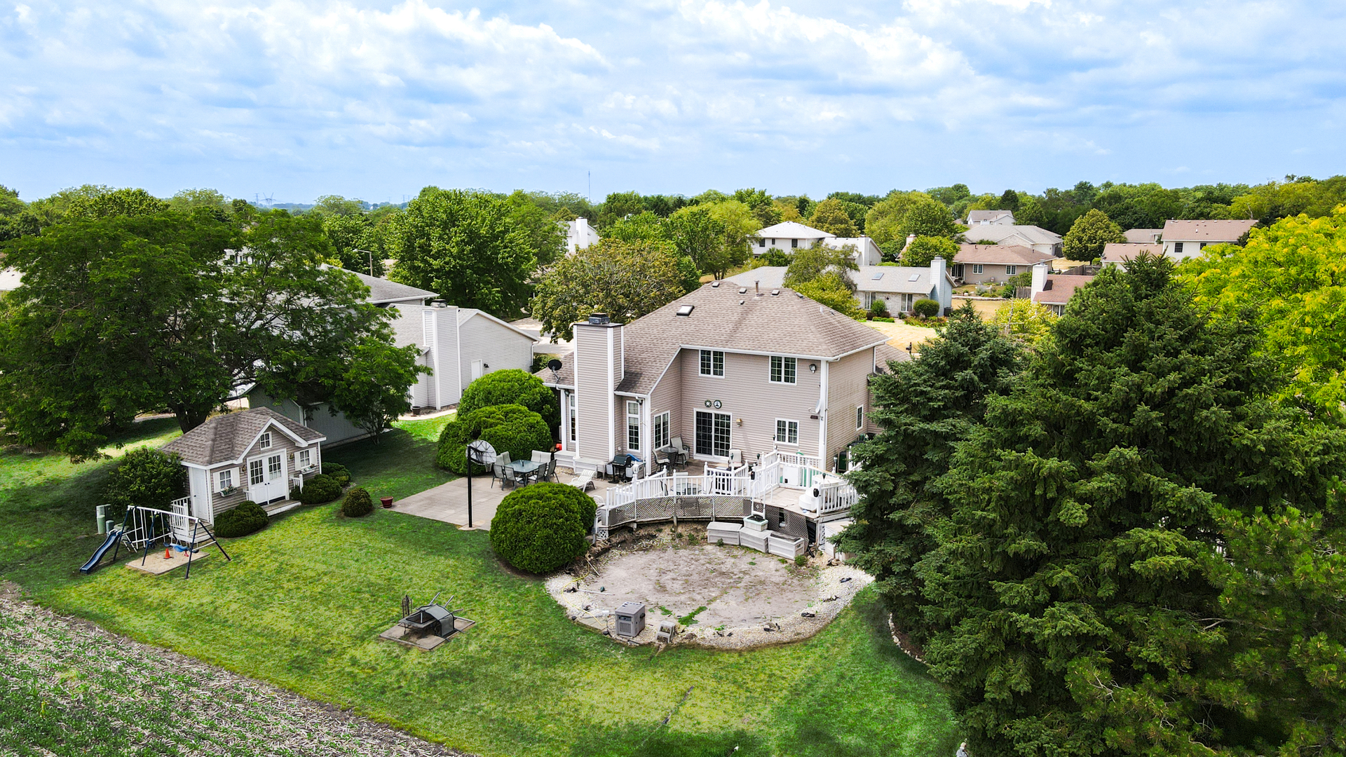308 Calla Drive Manhattan, IL 60442 - Photo 29 of 30 a aerial view of a house with table and chairs