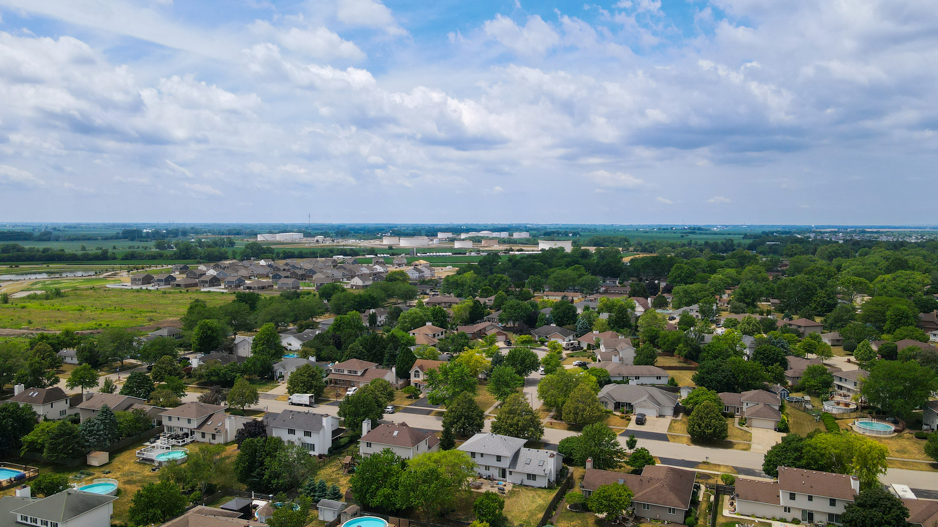 308 Calla Drive Manhattan, IL 60442 - Photo 30 of 30 an aerial view of a city with lots of residential buildings