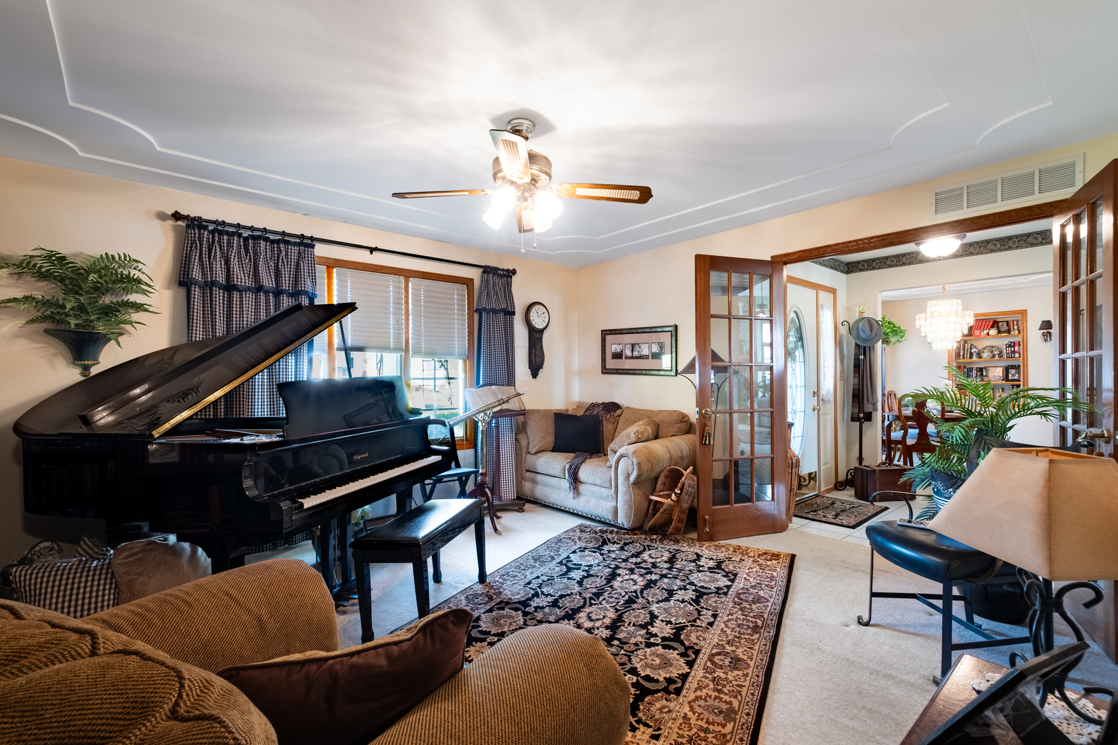 308 Calla Drive Manhattan, IL 60442 - Photo 6 of 30 a living room with furniture and a piano
