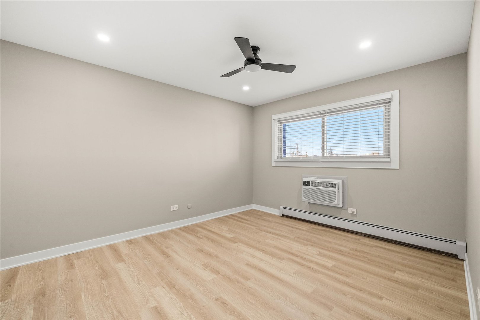 1313 Rebecca Road, Unit 101 Lombard, IL 60148 - Photo 16 of 18 a view of an empty room with a window