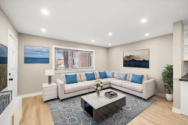 a living room with furniture and a couch