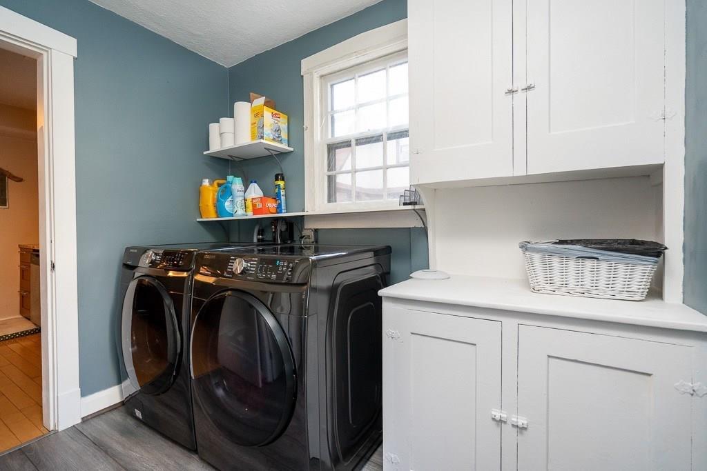 19 Perkins Street Springfield, MA 01118 - Photo 11 of 29 a utility room with dryer and washer