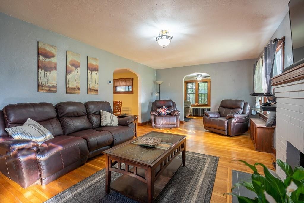 19 Perkins Street Springfield, MA 01118 - Photo 3 of 29 a living room with furniture a rug and a window
