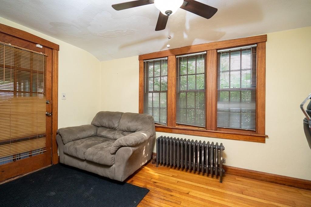 19 Perkins Street Springfield, MA 01118 - Photo 5 of 29 a living room with furniture and a window