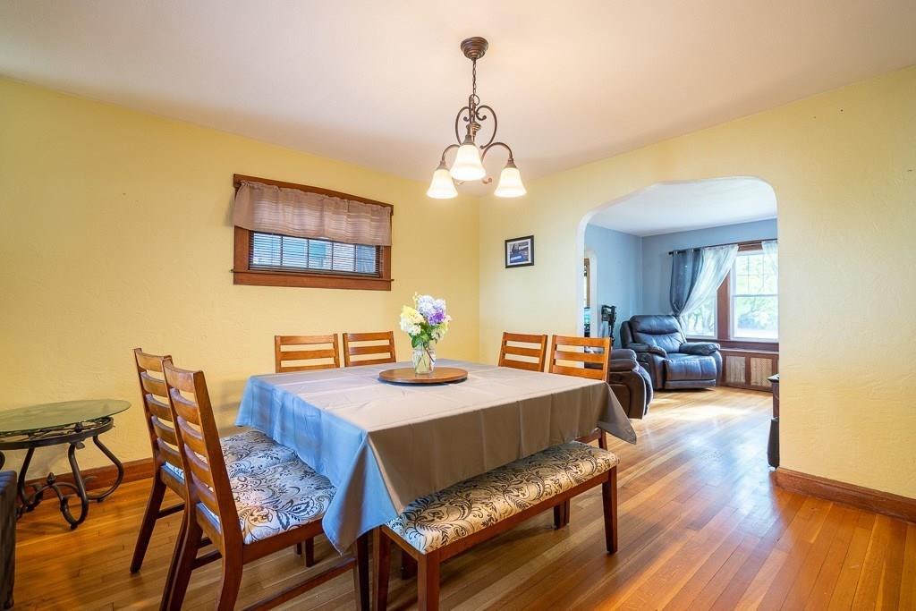 19 Perkins Street Springfield, MA 01118 - Photo 7 of 29 a view of a dining room with furniture and wooden floor